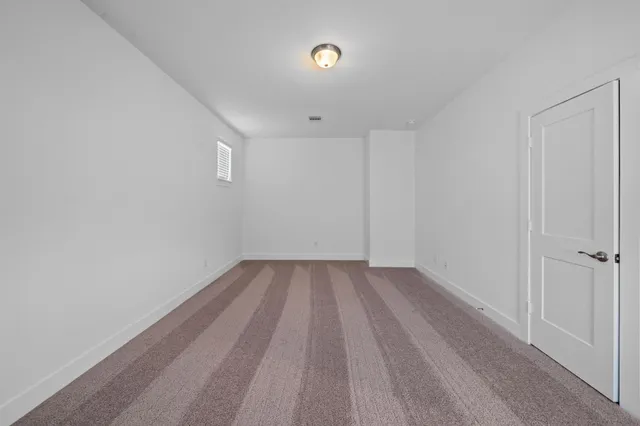 a view of room with walk in closet