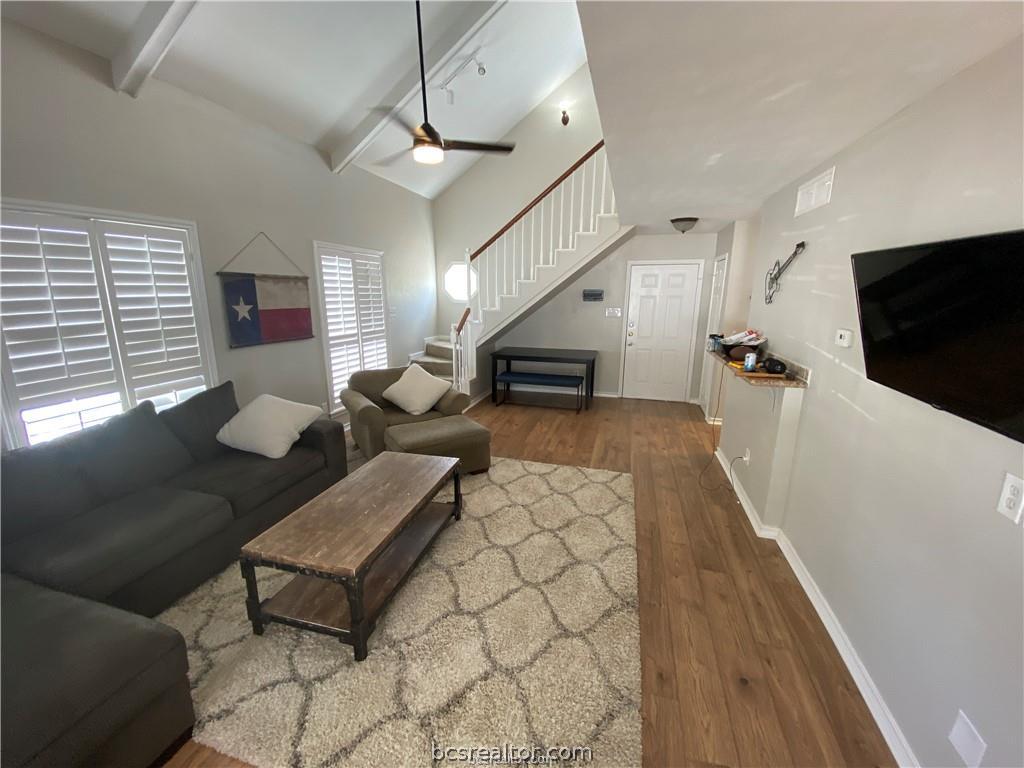 300 Cooner Street College Station, TX 77840 - Photo 2 of 9 a living room with furniture and a flat screen tv