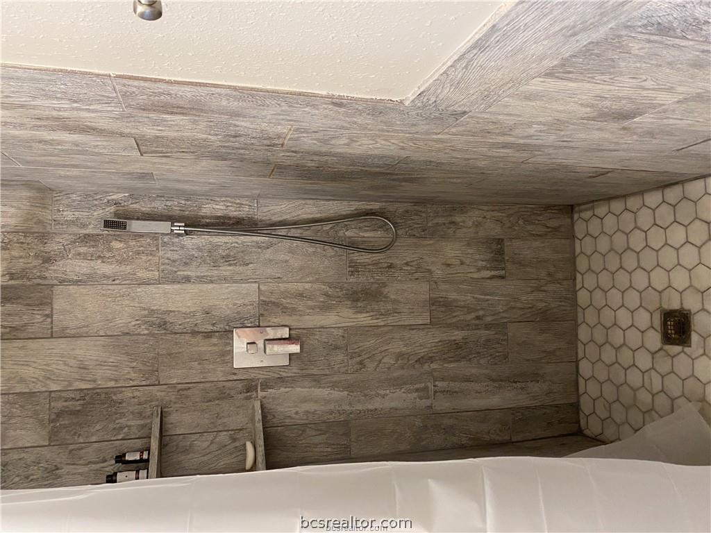300 Cooner Street College Station, TX 77840 - Photo 7 of 9 a bathroom with a shower
