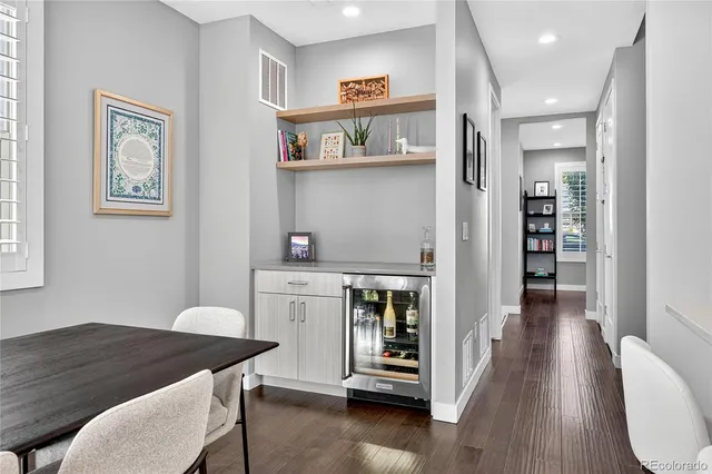 a kitchen with a table and chairs
