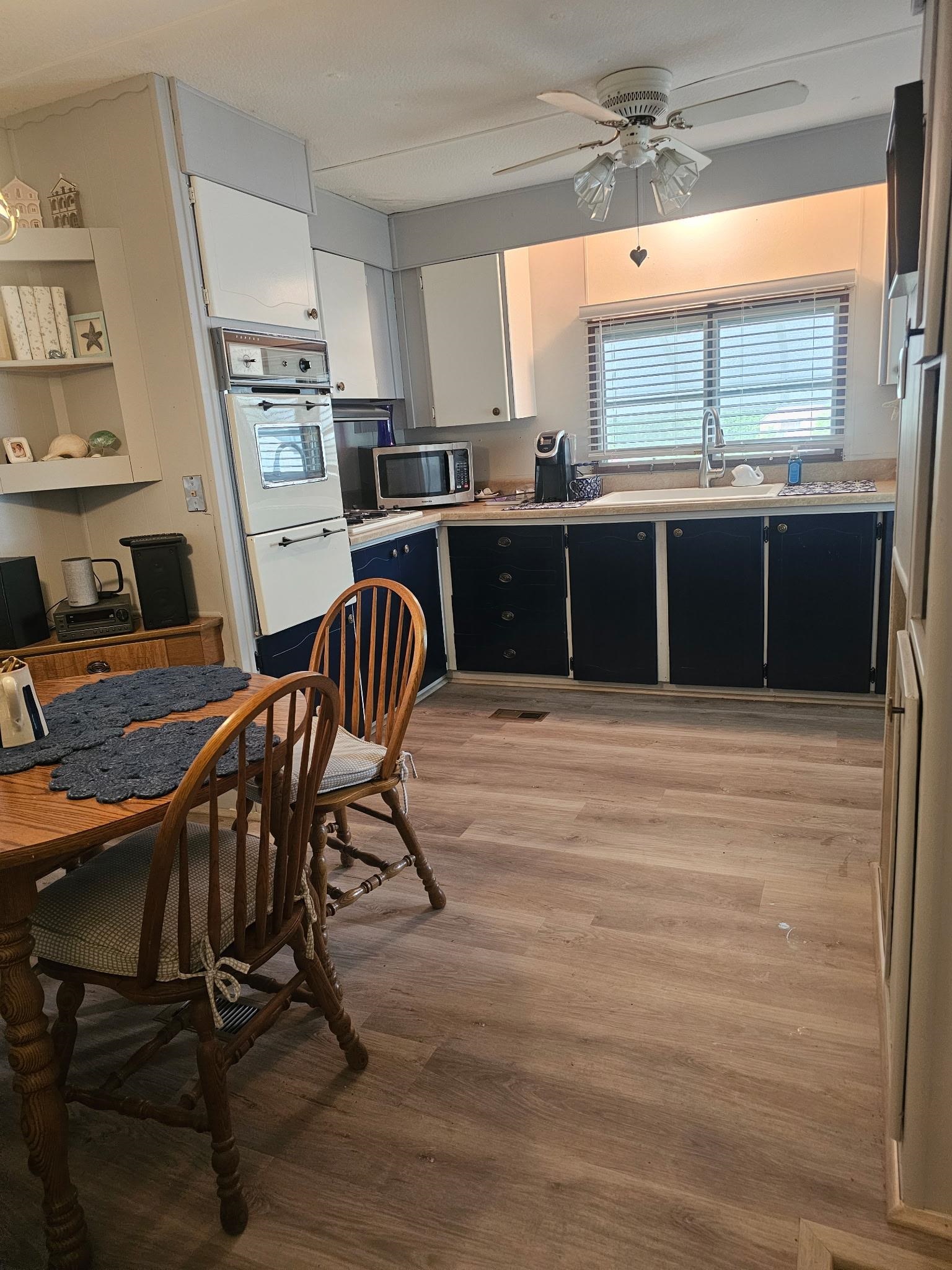 614 South Rte 9 Cape May Court House, NJ 08210 - Photo 5 of 9 a kitchen with stainless steel appliances kitchen island granite countertop a stove a sink and a refrigerator