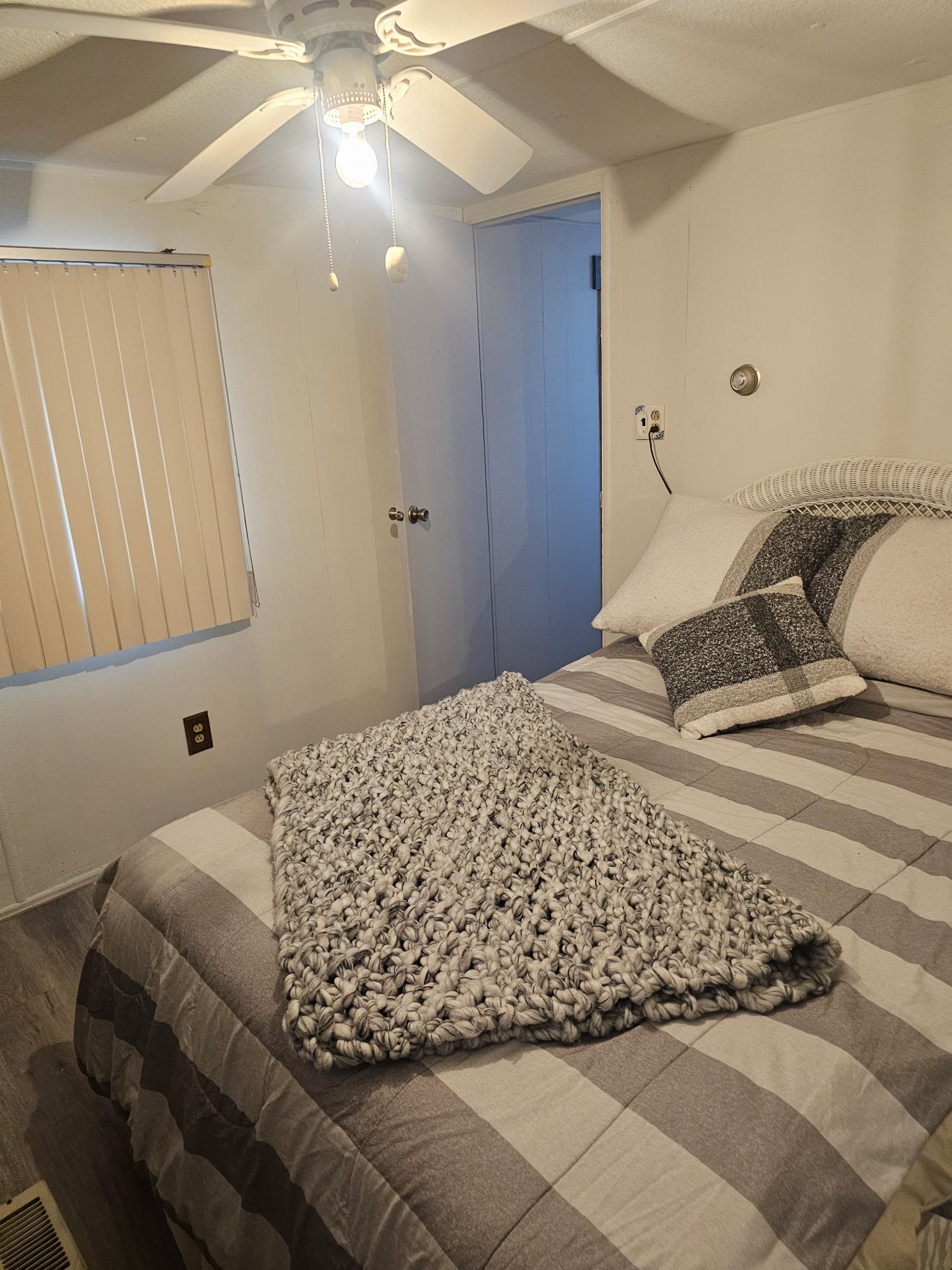 614 South Rte 9 Cape May Court House, NJ 08210 - Photo 8 of 9 a bedroom with a bed and a window