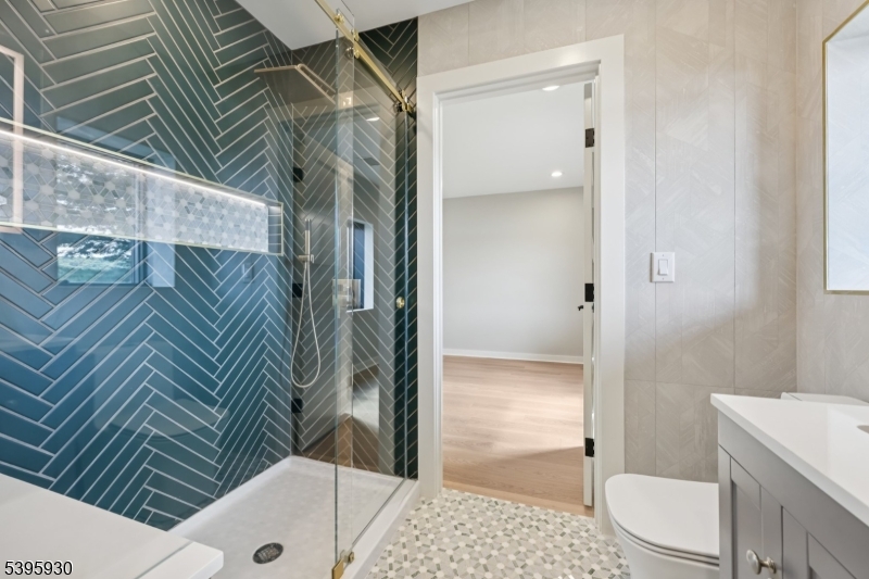12 Rocky Point Road West Milford, NJ 07421 - Photo 26 of 50 a bathroom with a sink a toilet and shower