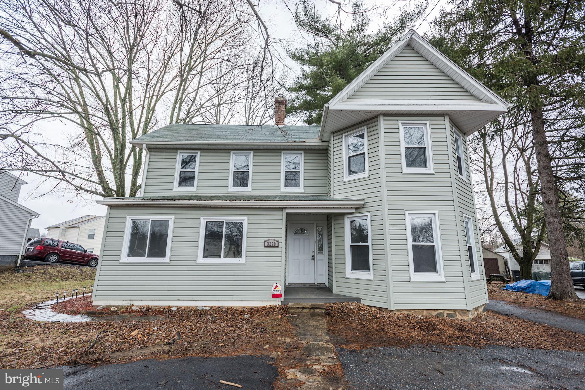 3220 Rolling Rd. Baltimore, MD 21244 - Photo 1 of 28 a front view of a house with a yard