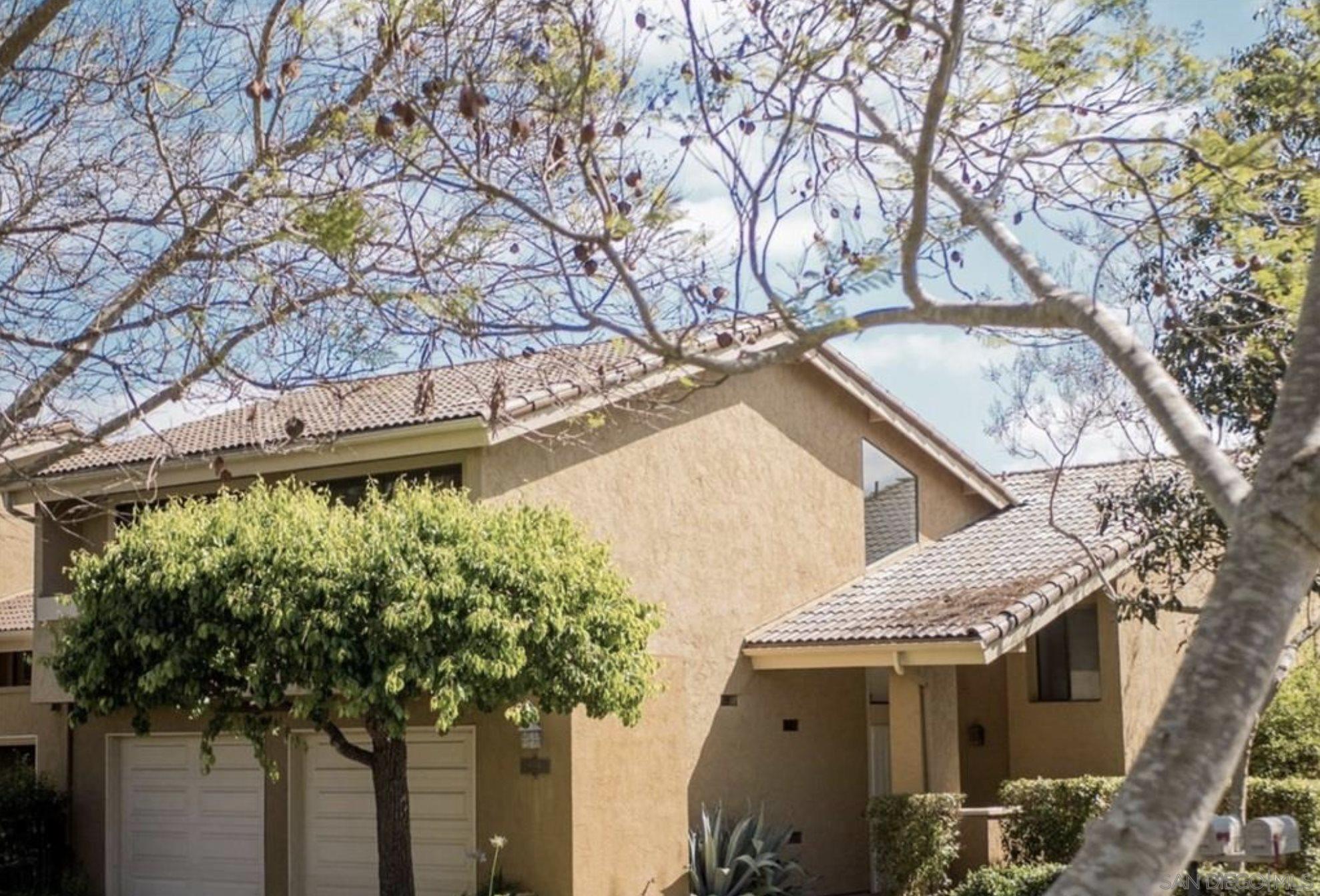 6555 Caminito Scioto La Jolla, CA 92037 - Photo 1 of 12 a house with a tree in front of it