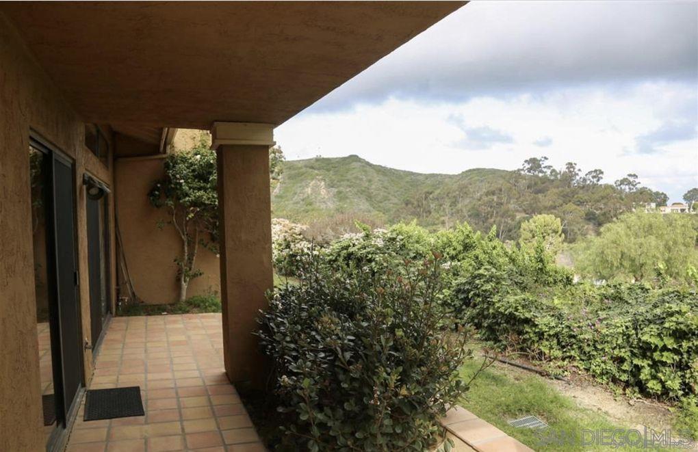 6555 Caminito Scioto La Jolla, CA 92037 - Photo 10 of 12 a view of a pathway of a house with a yard