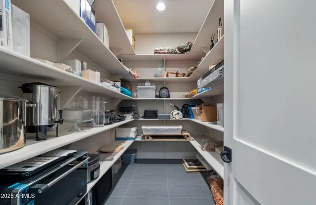 a bathroom with a toilet and a shower curtain