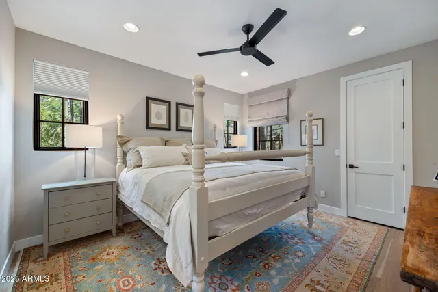 a living room with a couch and a large window