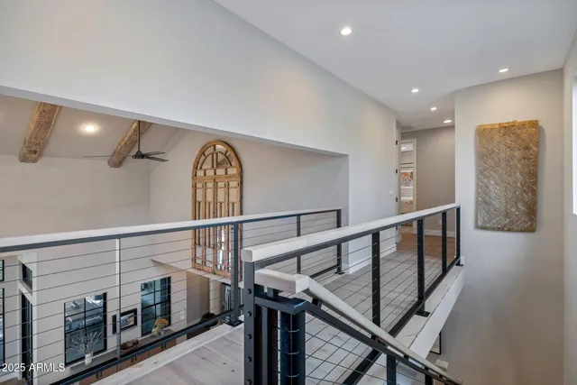 a view of a patio with couches and pool