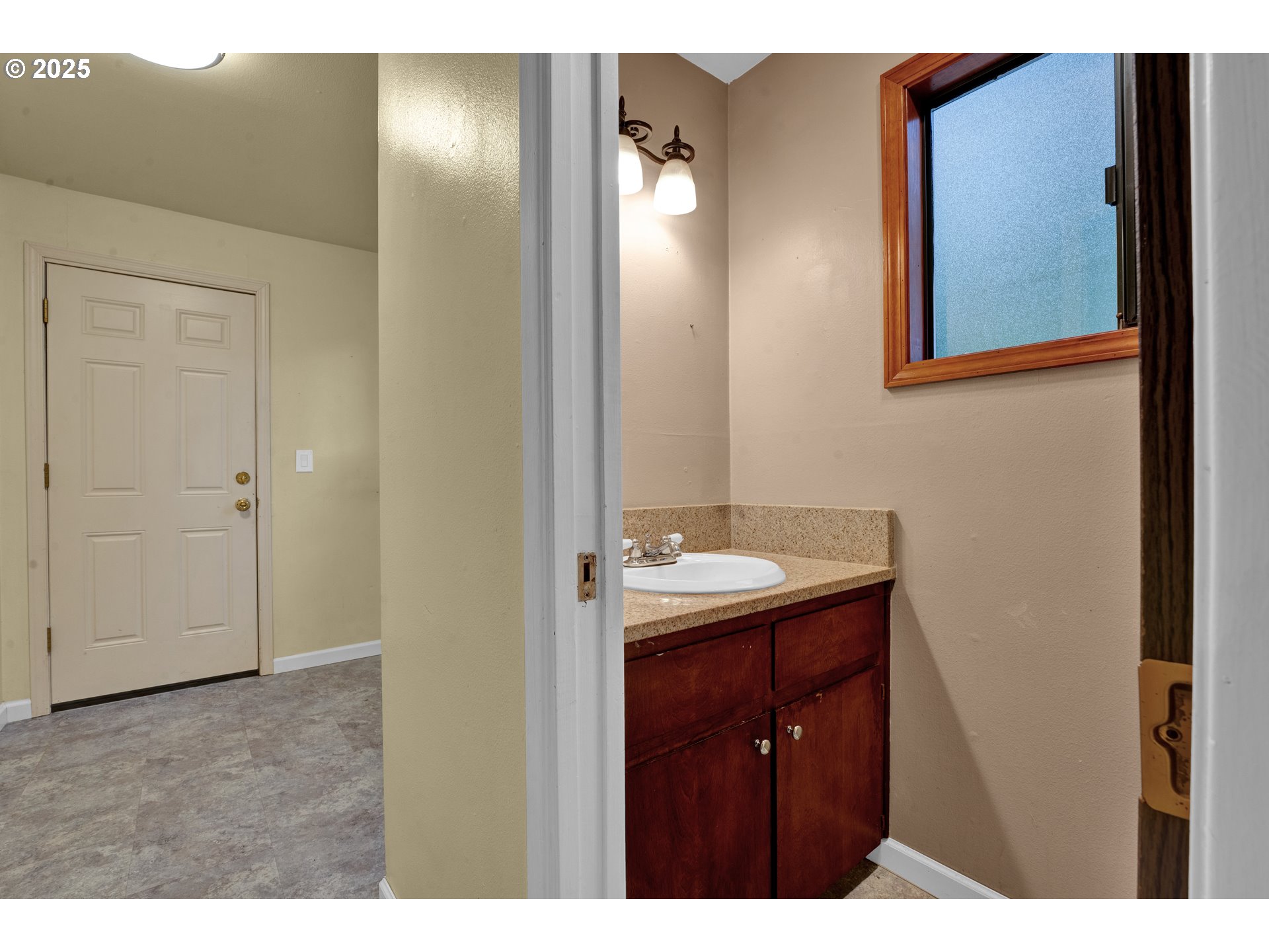 2850 Garfield Street Eugene, OR 97405 - Photo 16 of 46 a bathroom with a sink and mirror