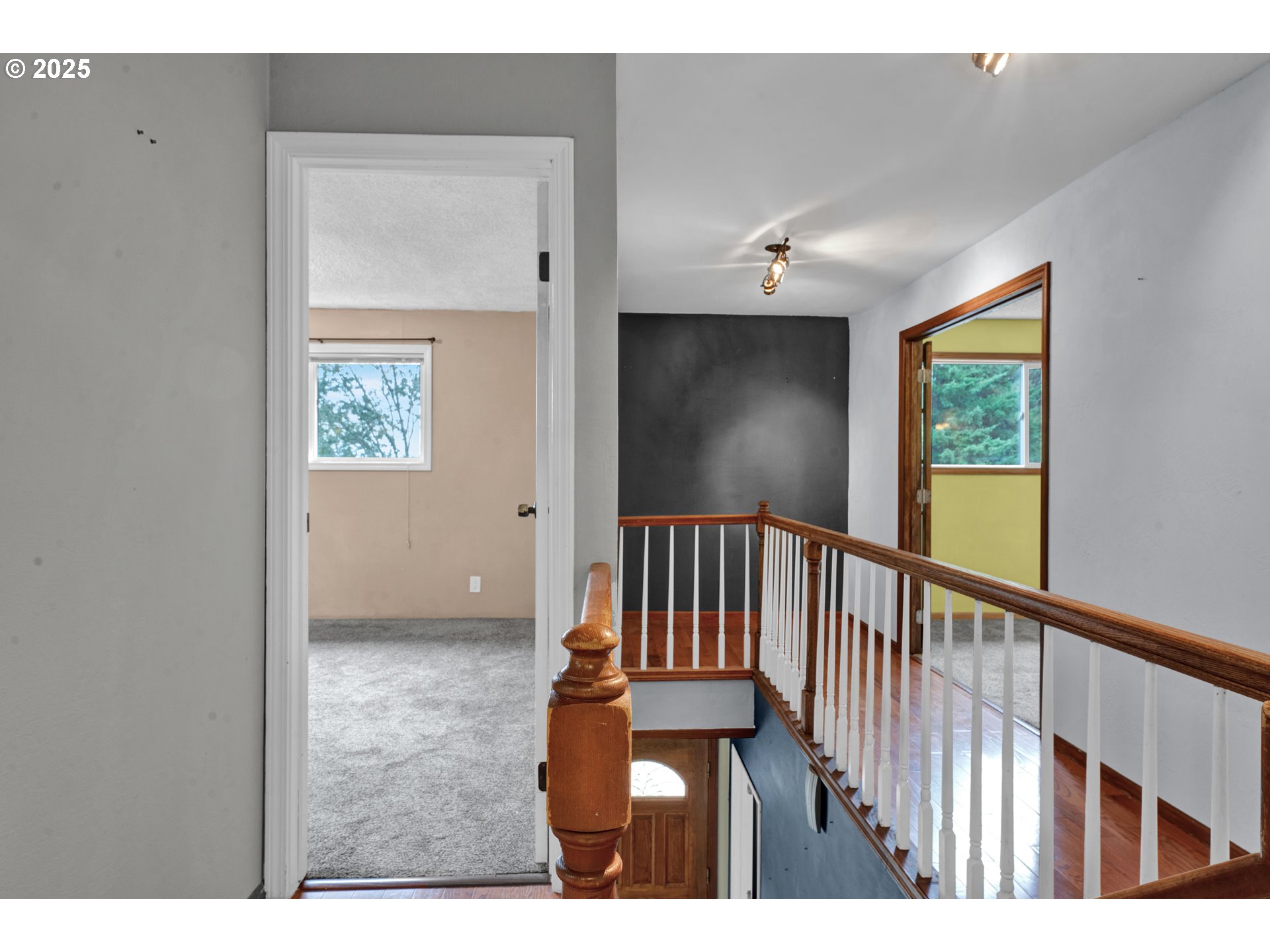2850 Garfield Street Eugene, OR 97405 - Photo 19 of 46 a view interior of a house with wooden floor windows and a chandelier