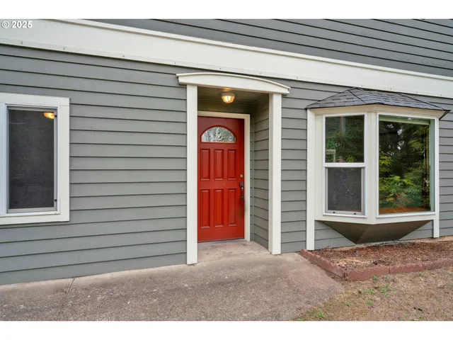 a front view of a house with a porch