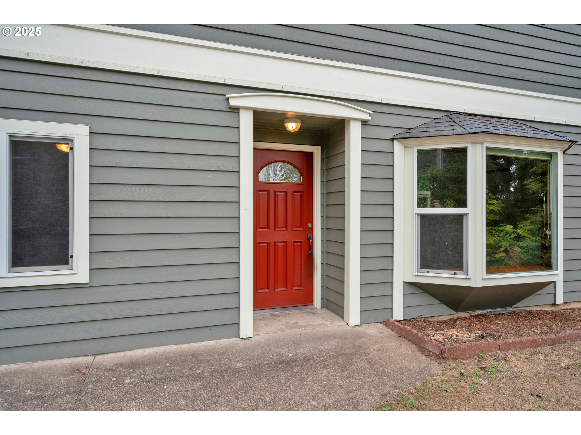 2850 Garfield Street Eugene, OR 97405 - Photo 3 of 46 a front view of a house with a porch