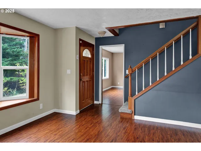 a view interior of a house wooden floor and windows