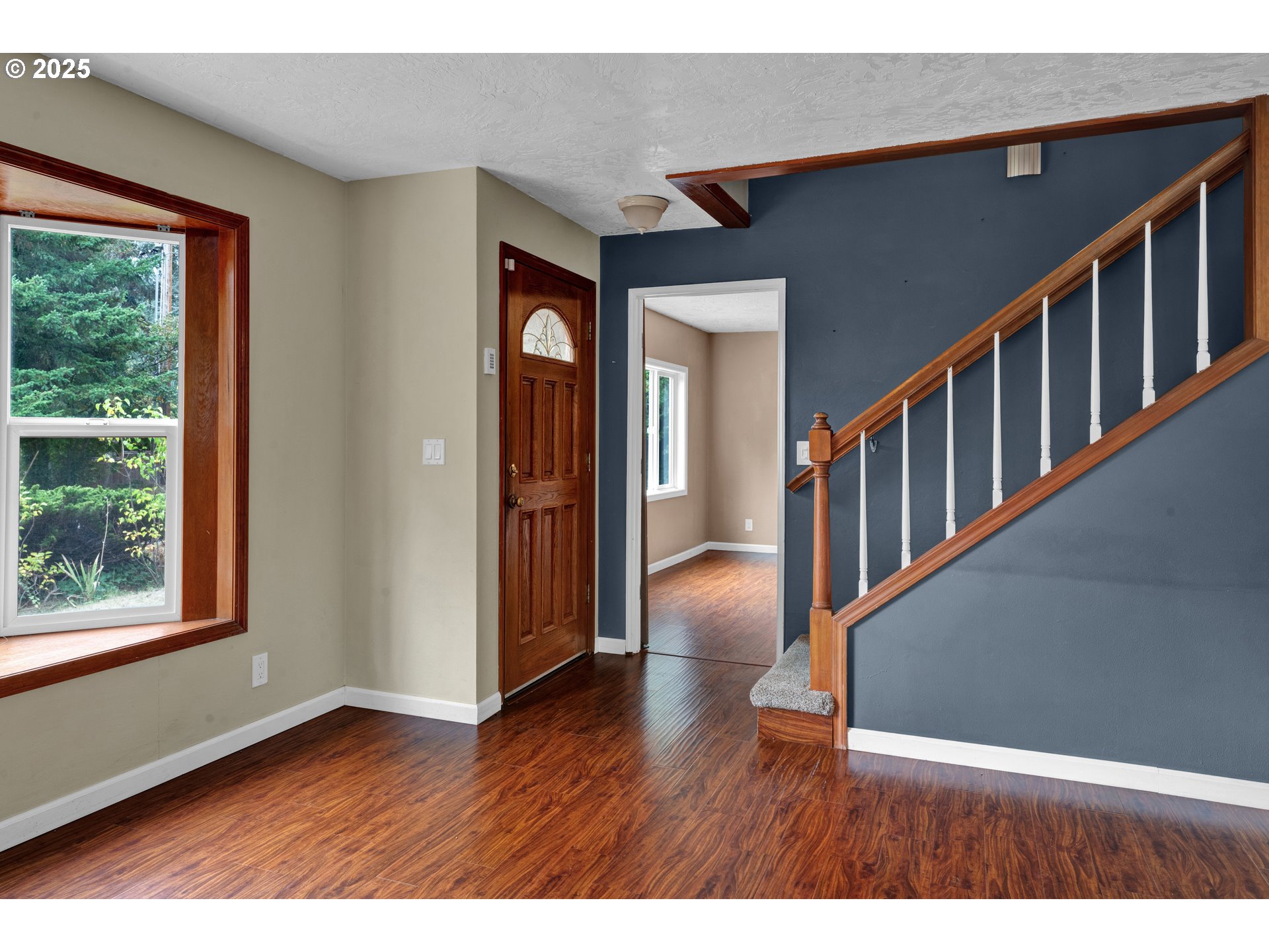 2850 Garfield Street Eugene, OR 97405 - Photo 4 of 46 a view interior of a house wooden floor and windows