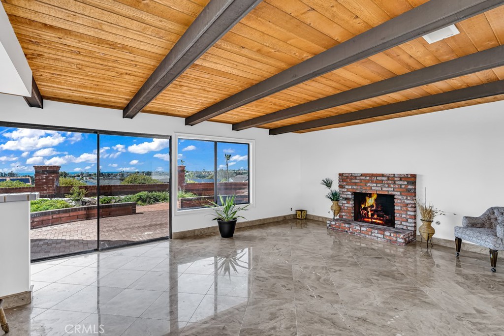 523 Calle Baranda San Clemente, CA 92673 - Photo 14 of 39 a living room with fireplace