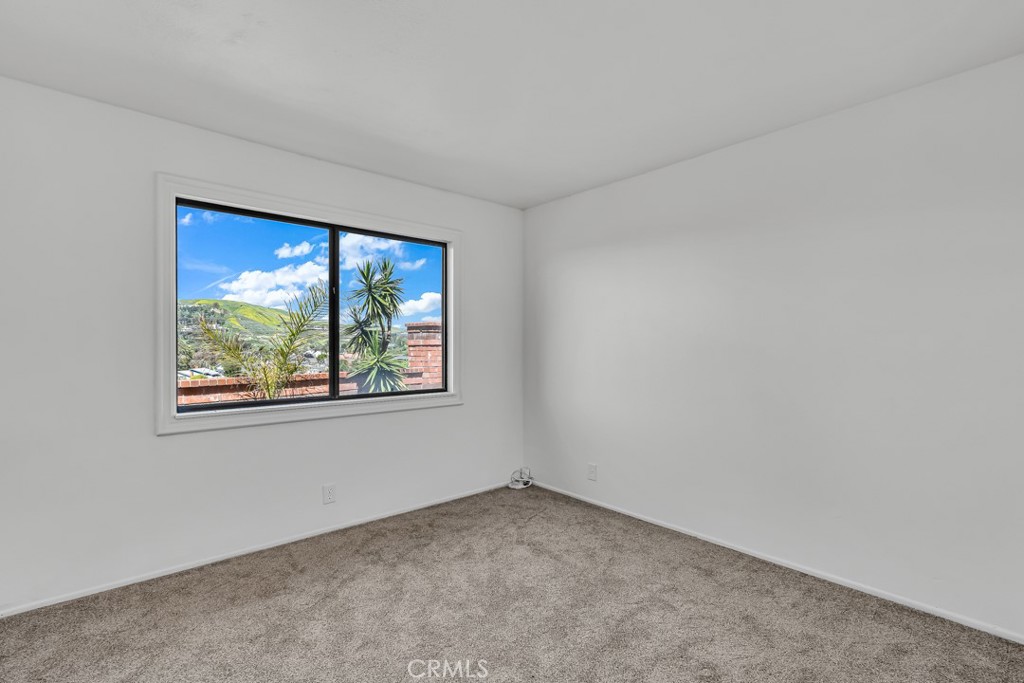 523 Calle Baranda San Clemente, CA 92673 - Photo 17 of 39 an empty room with a window