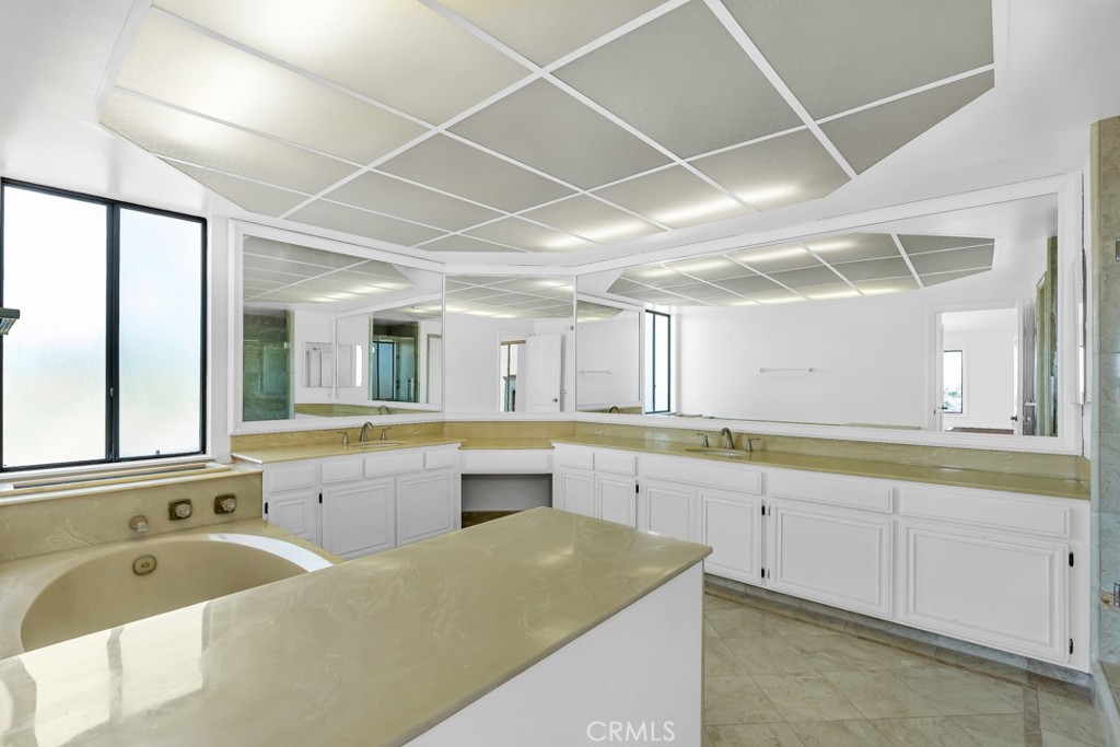 523 Calle Baranda San Clemente, CA 92673 - Photo 23 of 39 a large kitchen with a large window cabinets and stainless steel appliances