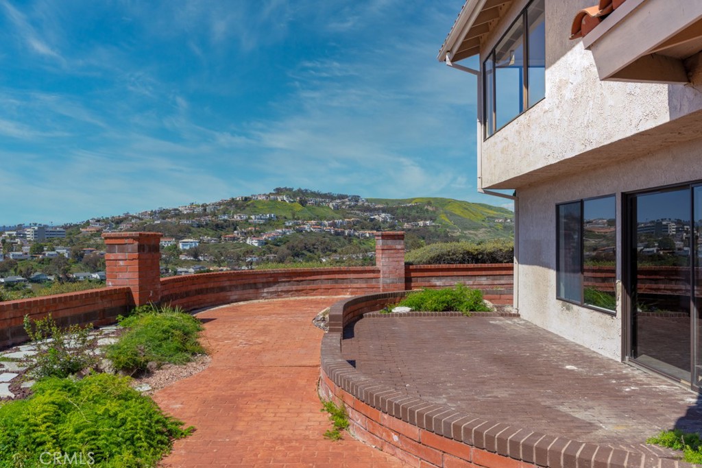 523 Calle Baranda San Clemente, CA 92673 - Photo 30 of 39 a view of a terrace with a garden