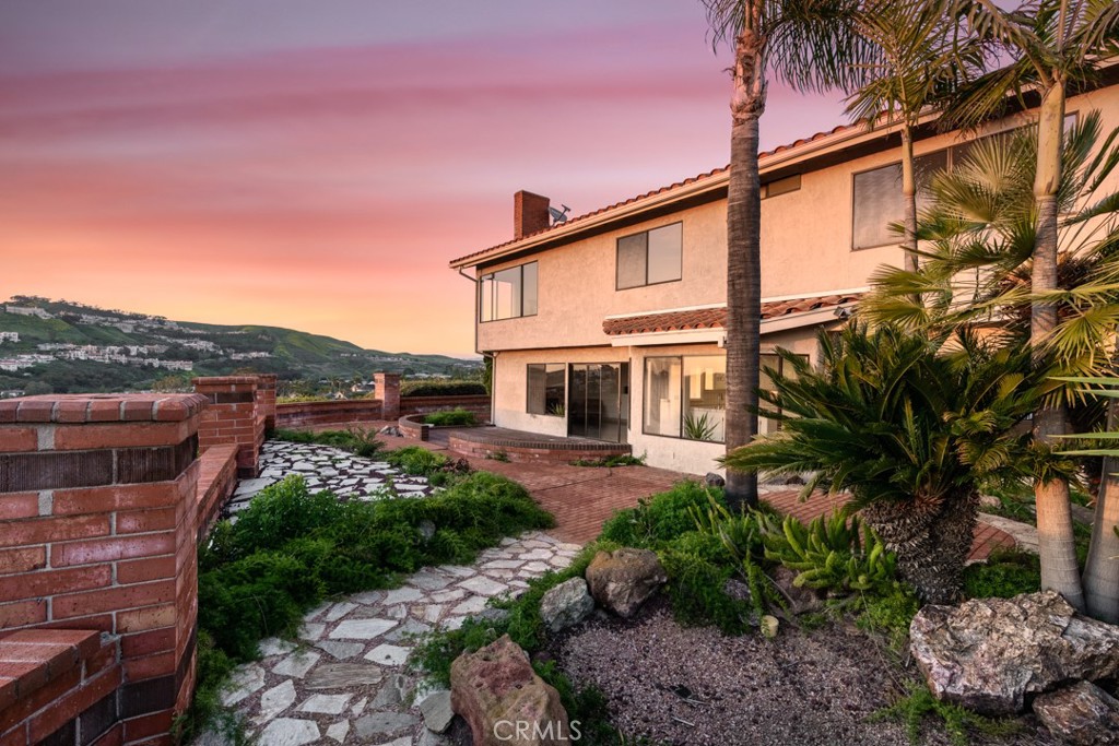 523 Calle Baranda San Clemente, CA 92673 - Photo 39 of 39 a front view of a house with garden