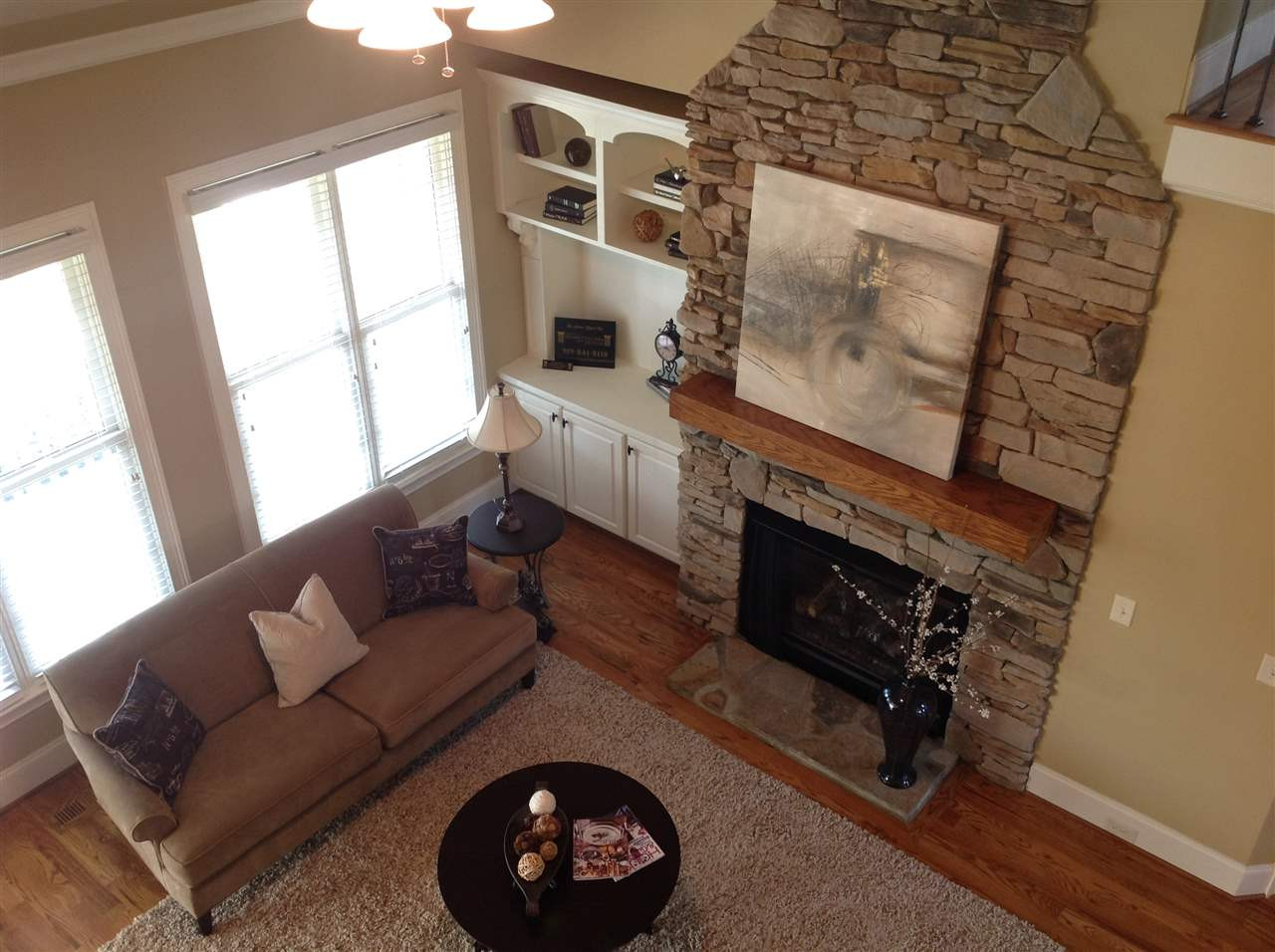 305 Woodlief Farm Road Rolesville, NC 27571 - Photo 3 of 25 Stunning Great Room is enhanced with hardwood floors and gas log stone fireplace. Stone Fireplace