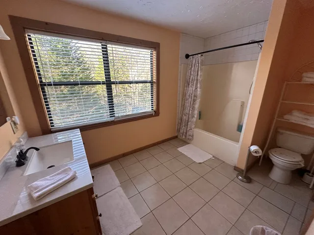 a view of a room with a window