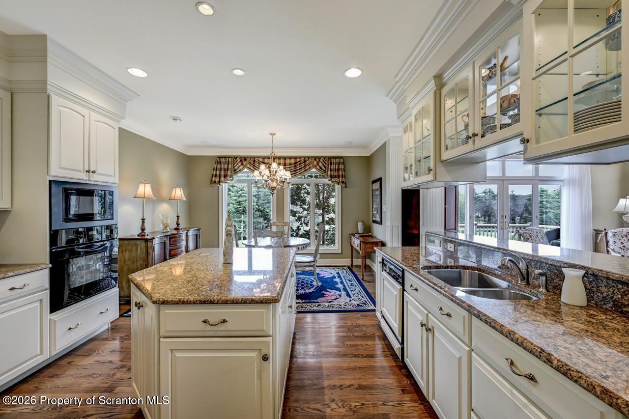 747 Greens Dallas, PA 18612 - Photo 23 of 98 a large kitchen with granite countertop a large counter top appliances and cabinets