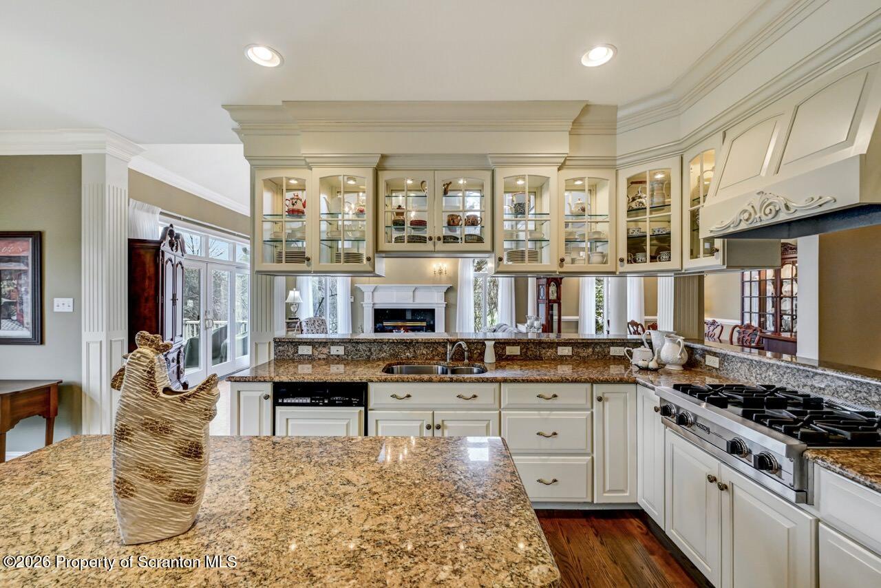 747 Greens Dallas, PA 18612 - Photo 25 of 98 a kitchen with stainless steel appliances granite countertop a stove and cabinets