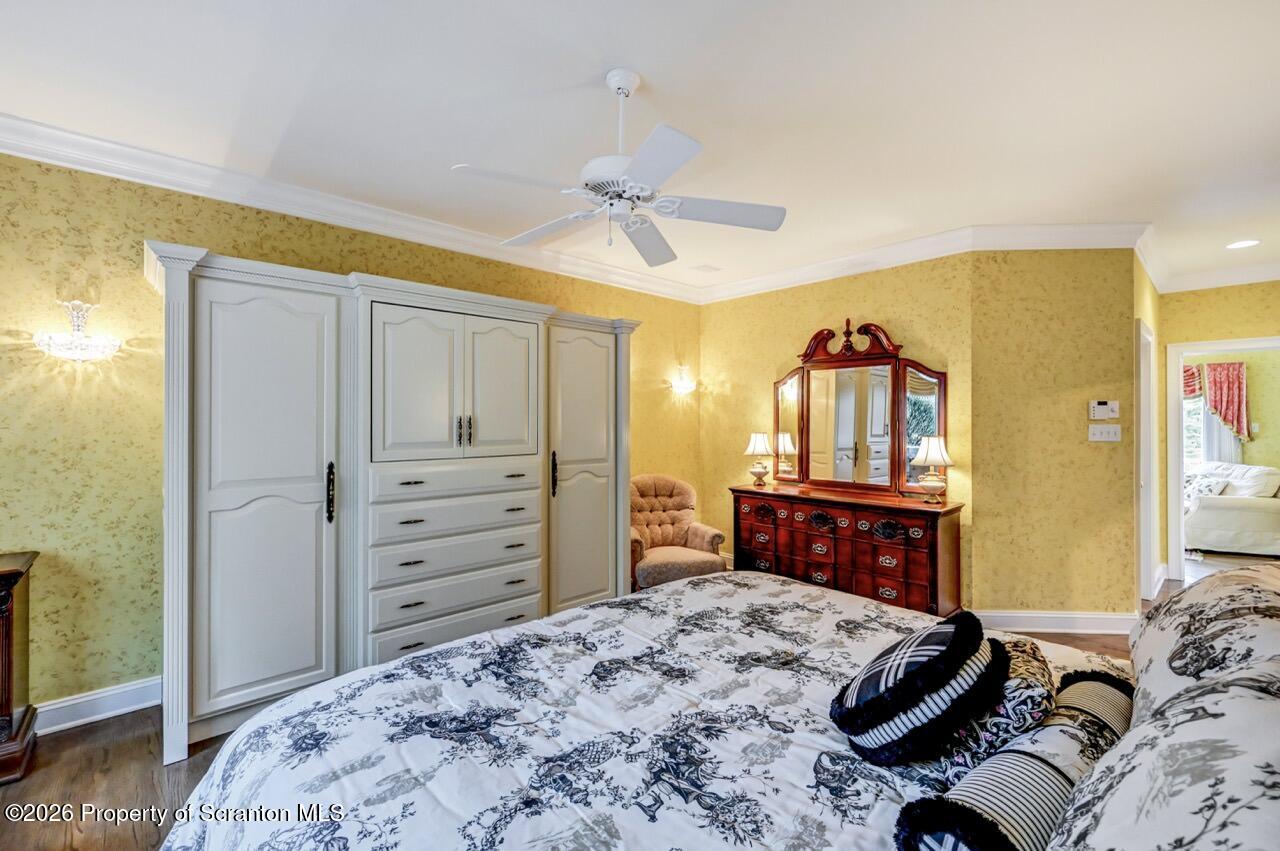 747 Greens Dallas, PA 18612 - Photo 39 of 98 a bedroom with a bed and a dresser in it