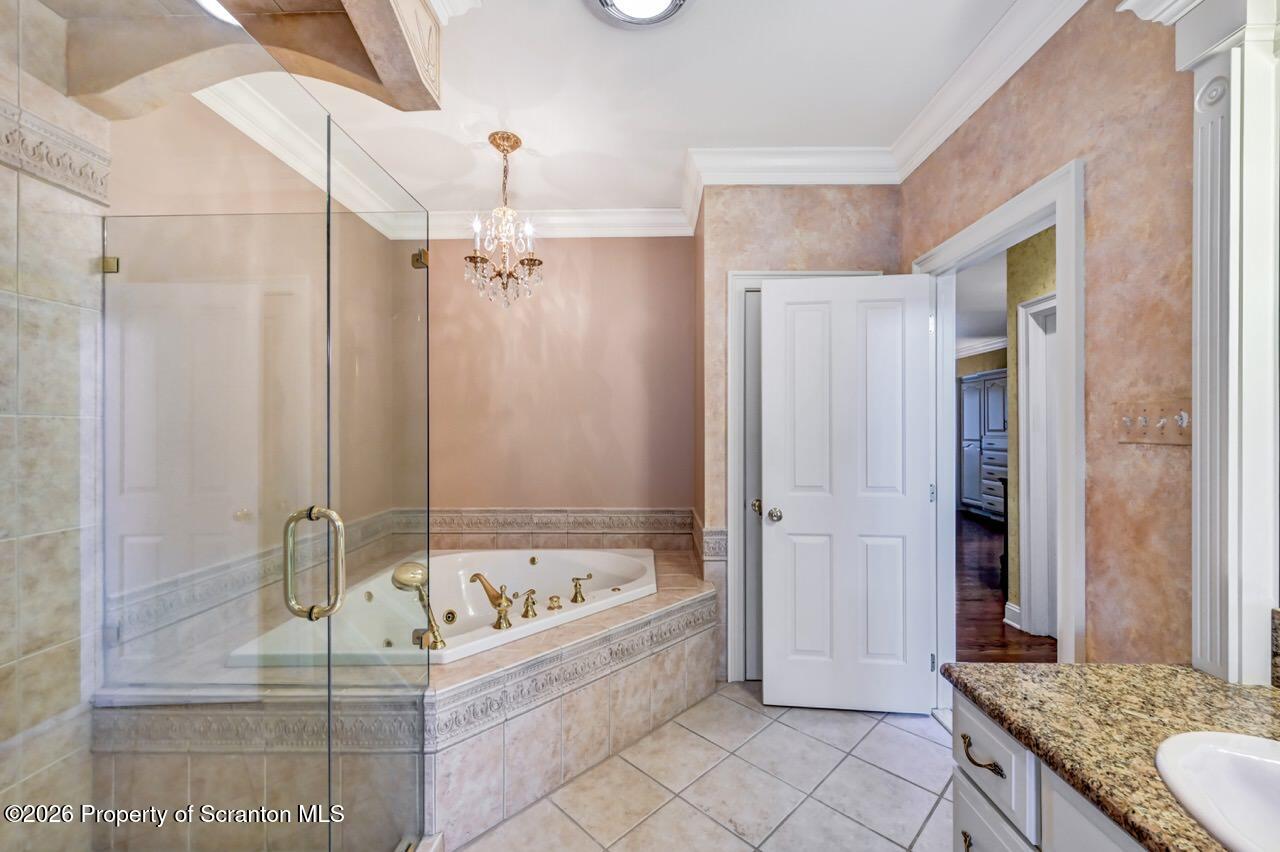 747 Greens Dallas, PA 18612 - Photo 47 of 98 a bathroom with a bathtub and a shower