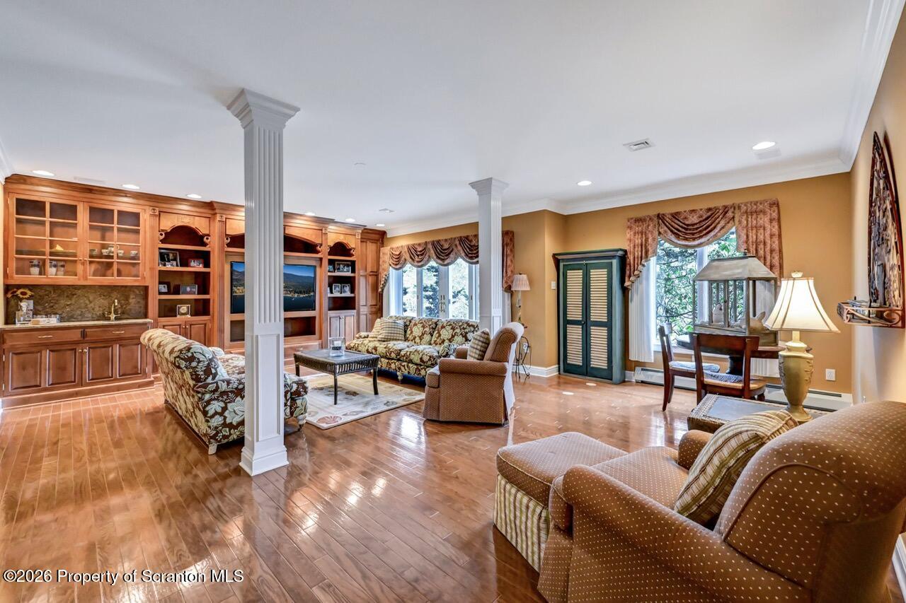 747 Greens Dallas, PA 18612 - Photo 57 of 98 a living room with furniture kitchen view and large windows