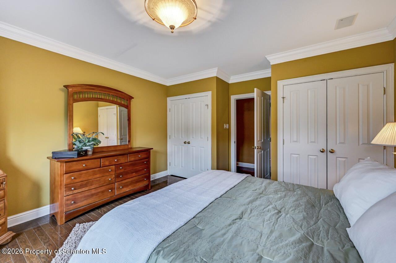 747 Greens Dallas, PA 18612 - Photo 67 of 98 a bedroom with a bed and a dresser