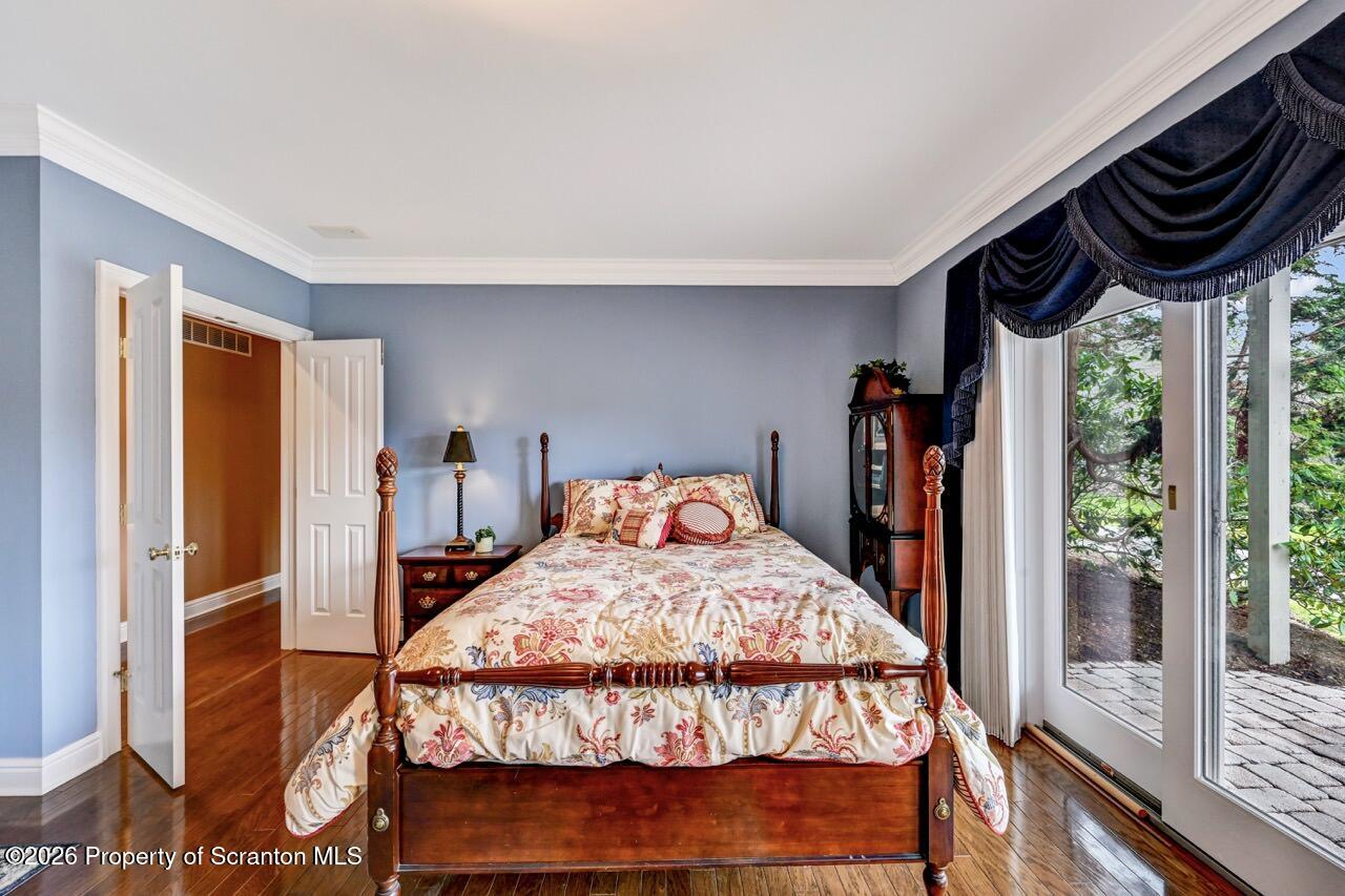 747 Greens Dallas, PA 18612 - Photo 70 of 98 a bed sitting in a bedroom next to a window