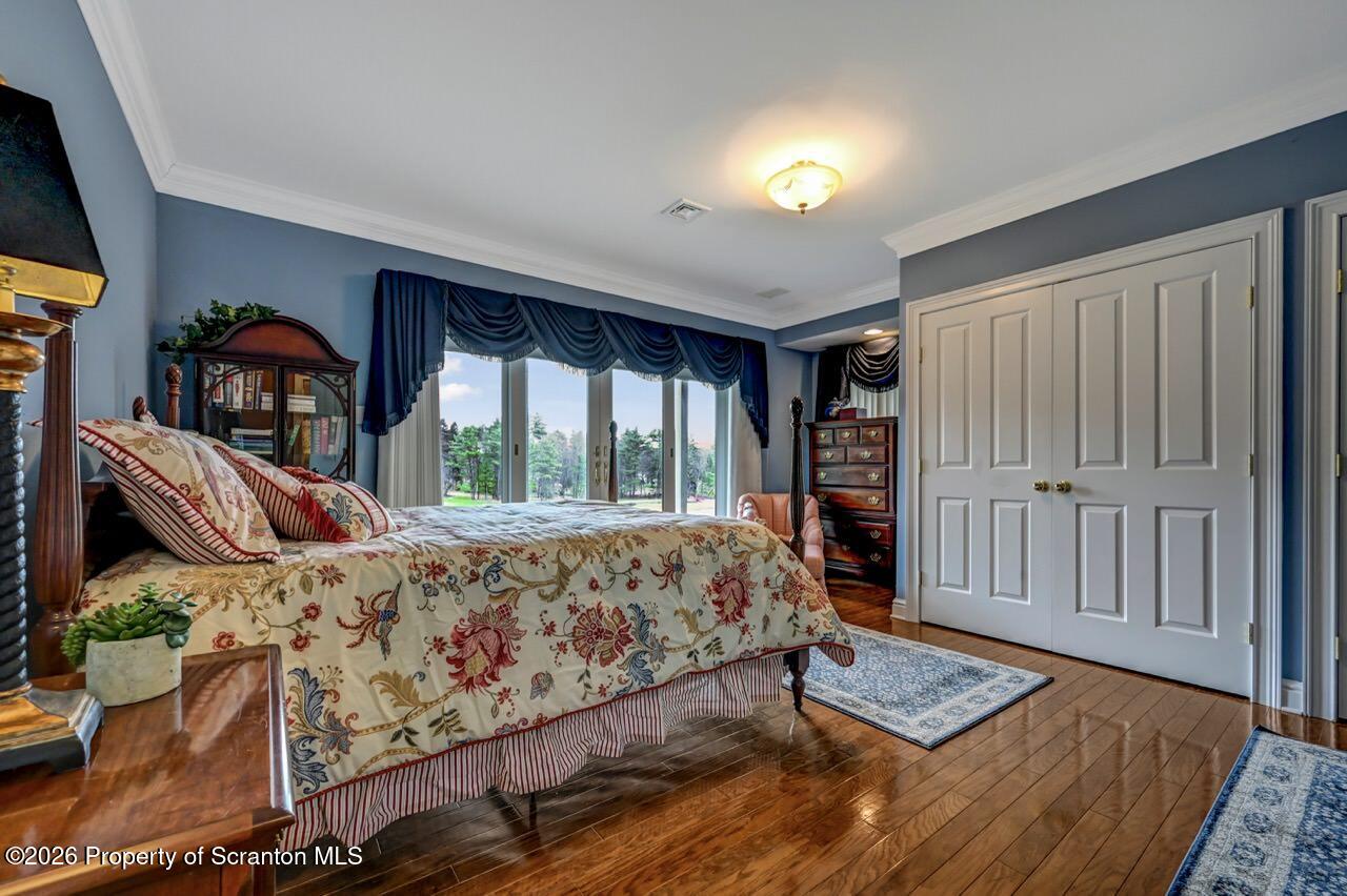 747 Greens Dallas, PA 18612 - Photo 72 of 98 a bed sitting in a bedroom next to a window