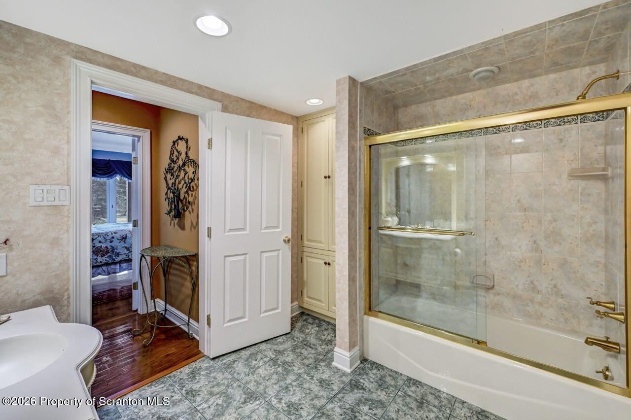 747 Greens Dallas, PA 18612 - Photo 75 of 98 a bathroom with a shower and a sink