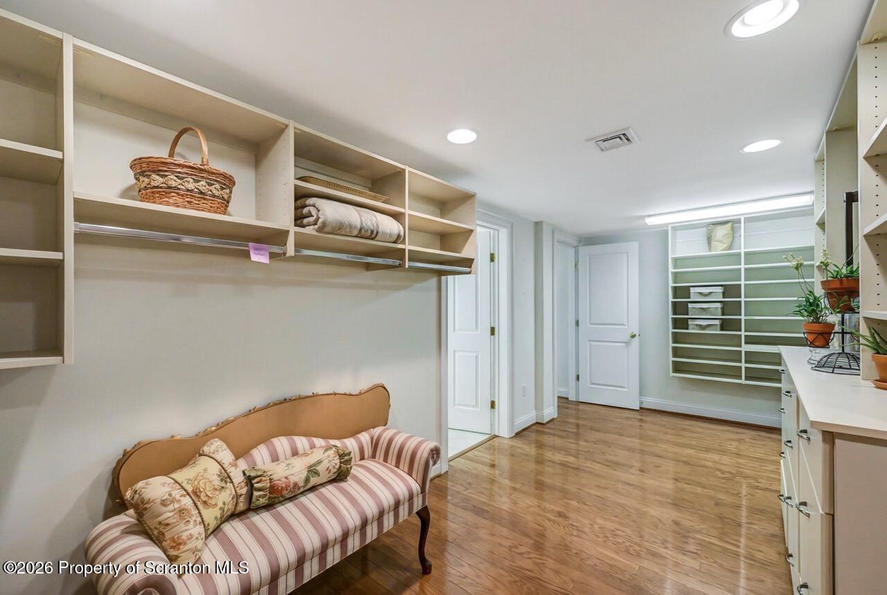 747 Greens Dallas, PA 18612 - Photo 76 of 98 a bedroom with a bed and a chair
