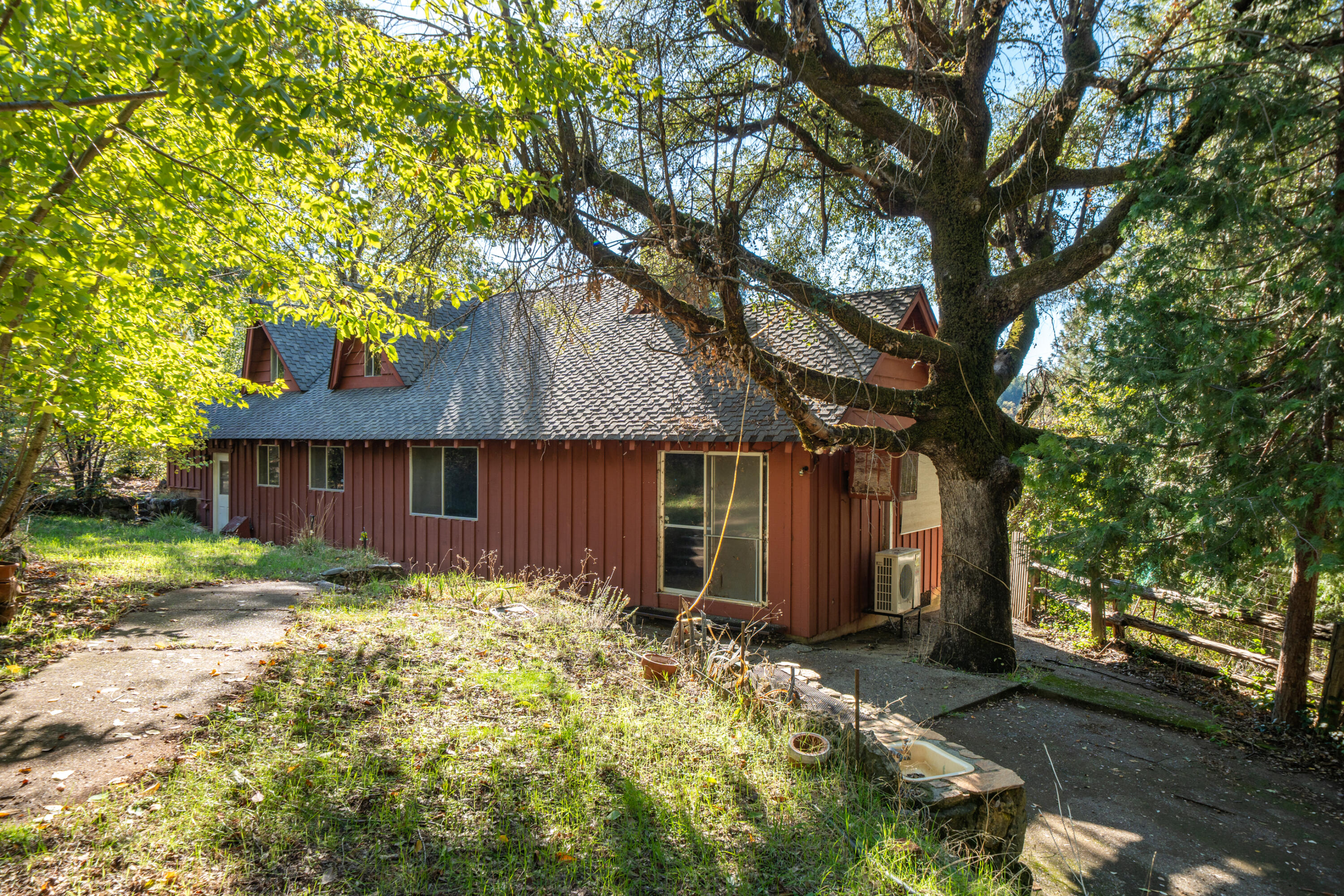 20389 Our Road Lakehead, CA 96051 - Photo 38 of 92 a front view of house with yard and trees around