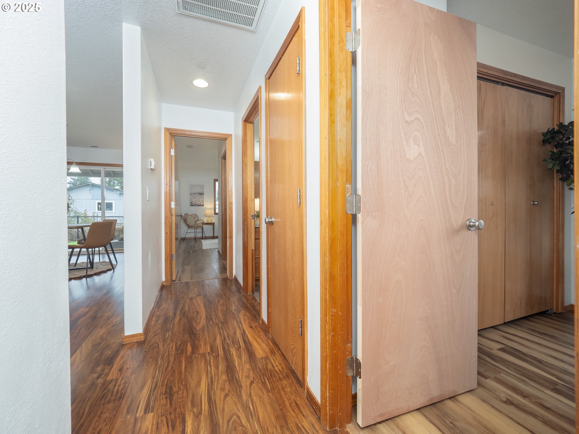 402 East Washington Street Carlton, OR 97111 - Photo 21 of 36 a view of a hallway with wooden floor