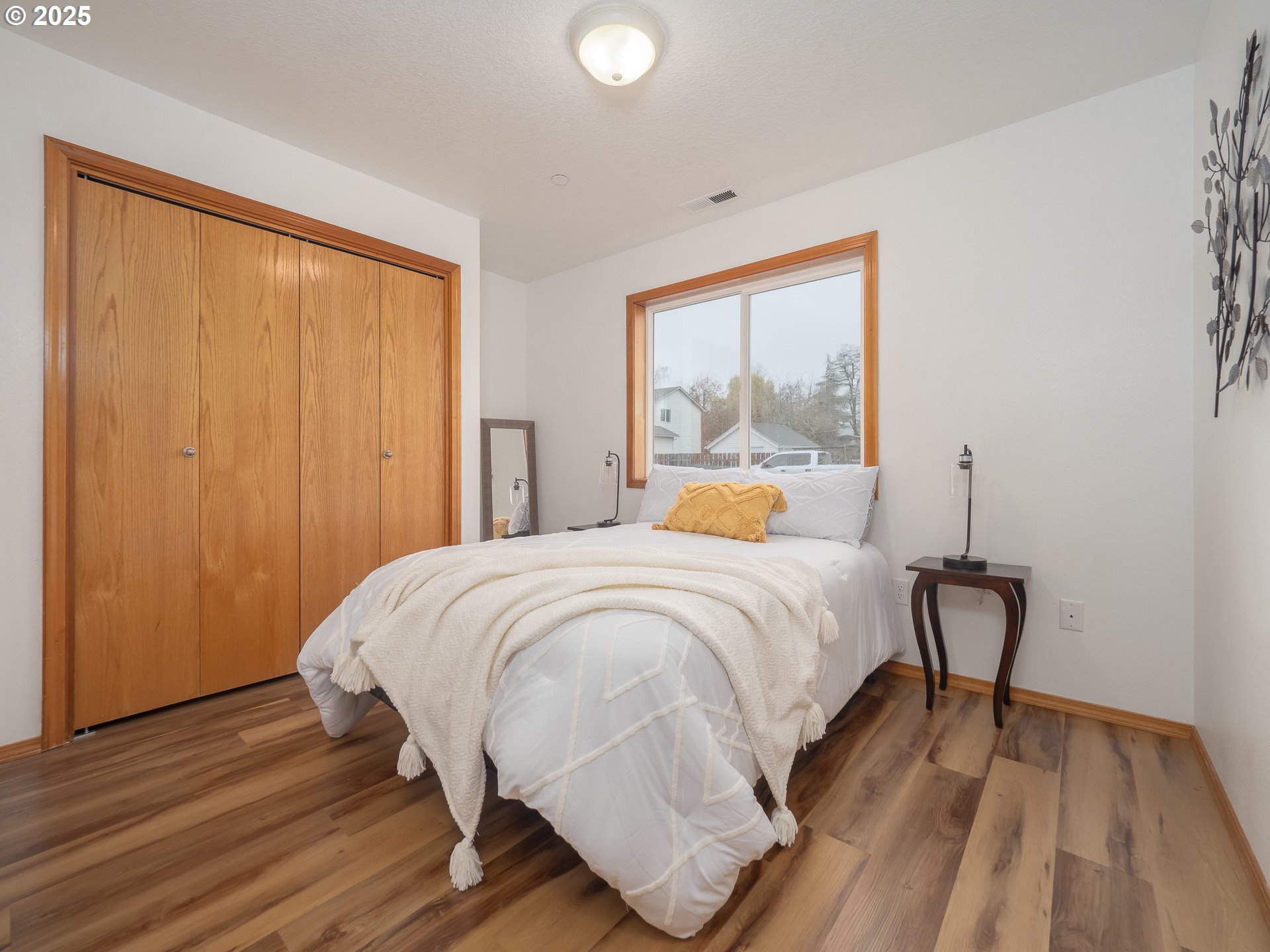 402 East Washington Street Carlton, OR 97111 - Photo 25 of 36 a bedroom with a bed and a window