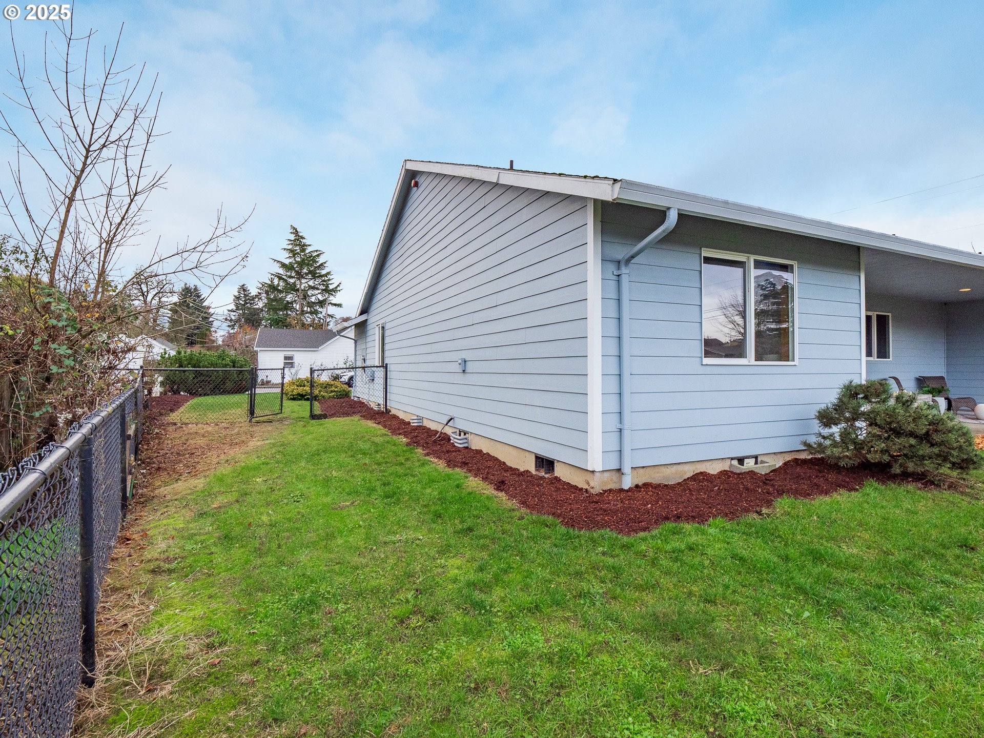 402 East Washington Street Carlton, OR 97111 - Photo 33 of 36 a view of backyard with sitting area