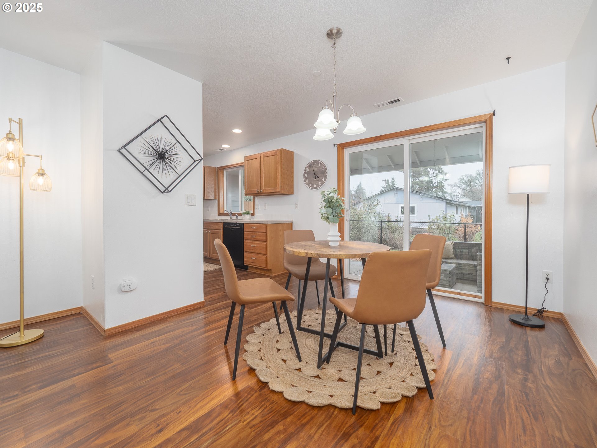 402 East Washington Street Carlton, OR 97111 - Photo 8 of 36 a view of a dining room with furniture window and wooden floor