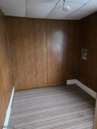 a view of kitchen appliances with wooden floor