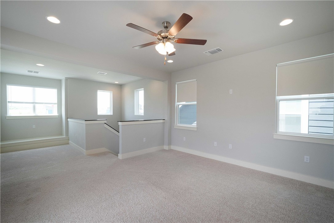 9124 Cattle Baron Path Austin, TX 78747 - Photo 18 of 36 a view of an empty room with a window