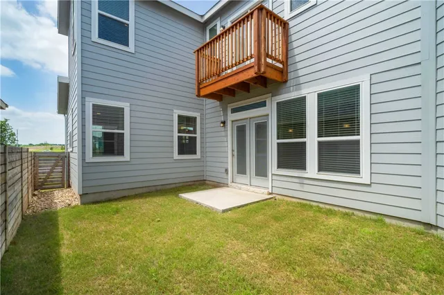 a view of a house with pool and porch