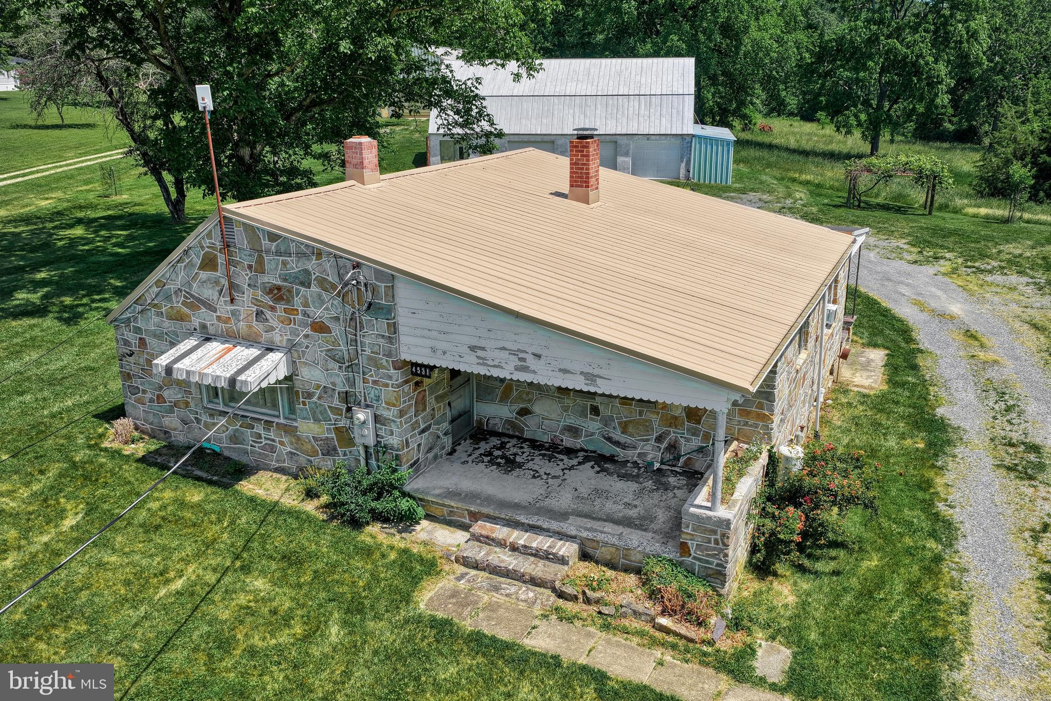 4531 Cold Springs Road Fayetteville, PA 17222 - Photo 48 of 86 an aerial view of a house with yard and patio