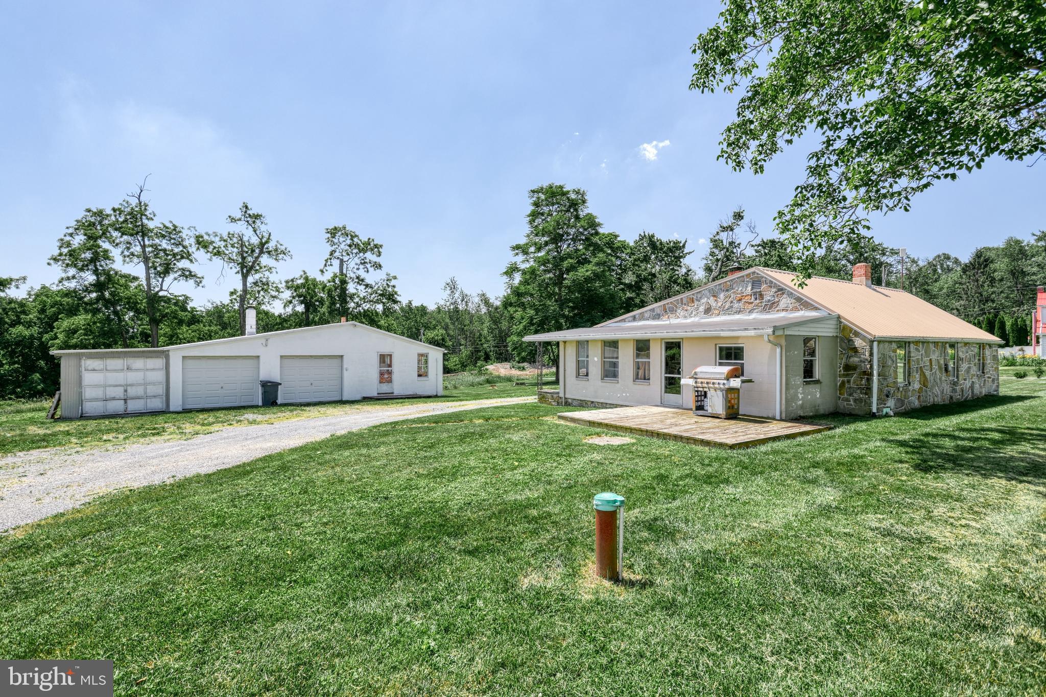 4531 Cold Springs Road Fayetteville, PA 17222 - Photo 6 of 86 a front view of a house with a yard and trees