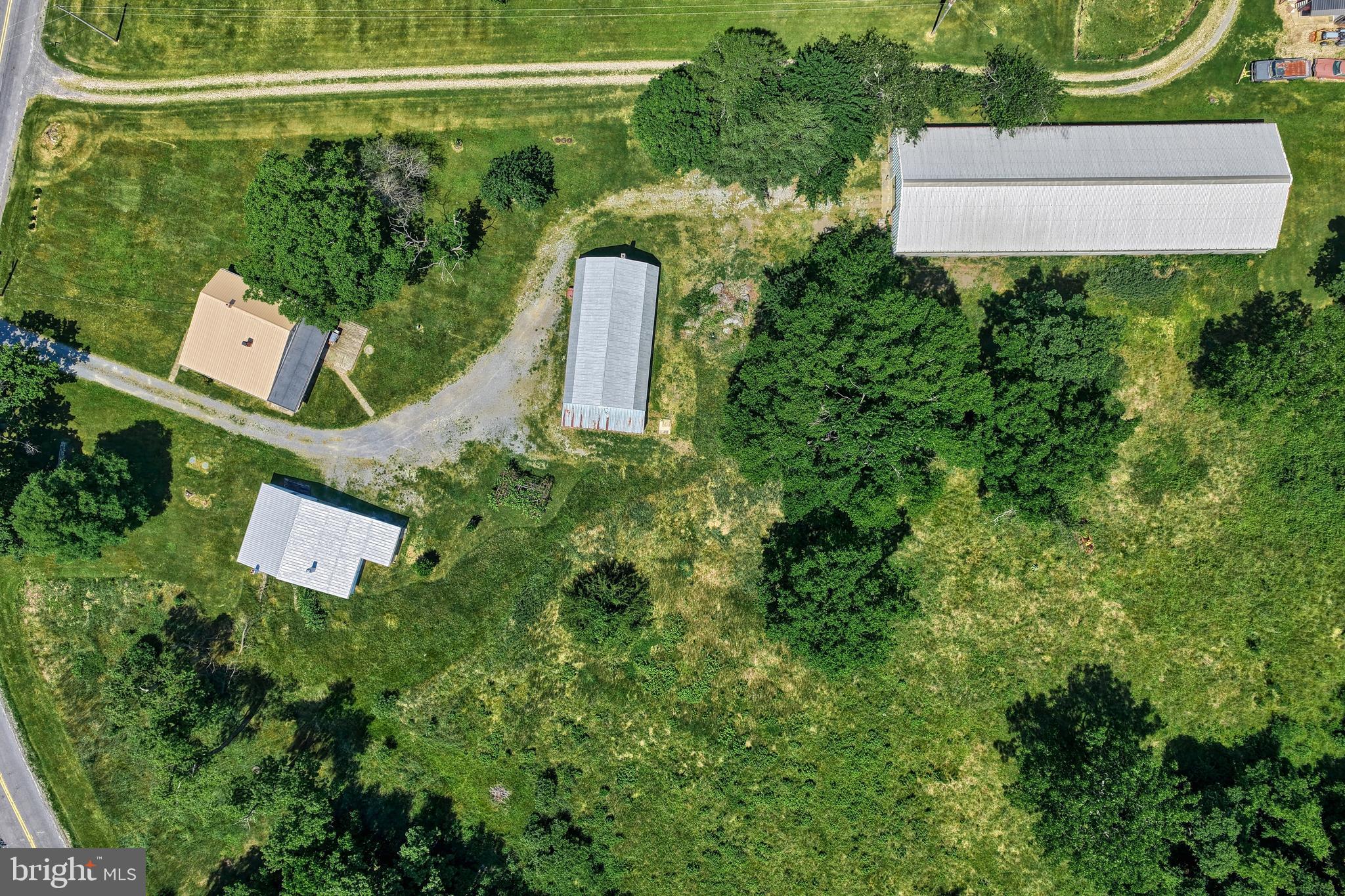 4531 Cold Springs Road Fayetteville, PA 17222 - Photo 70 of 86 an aerial view of a house with a yard and lake view