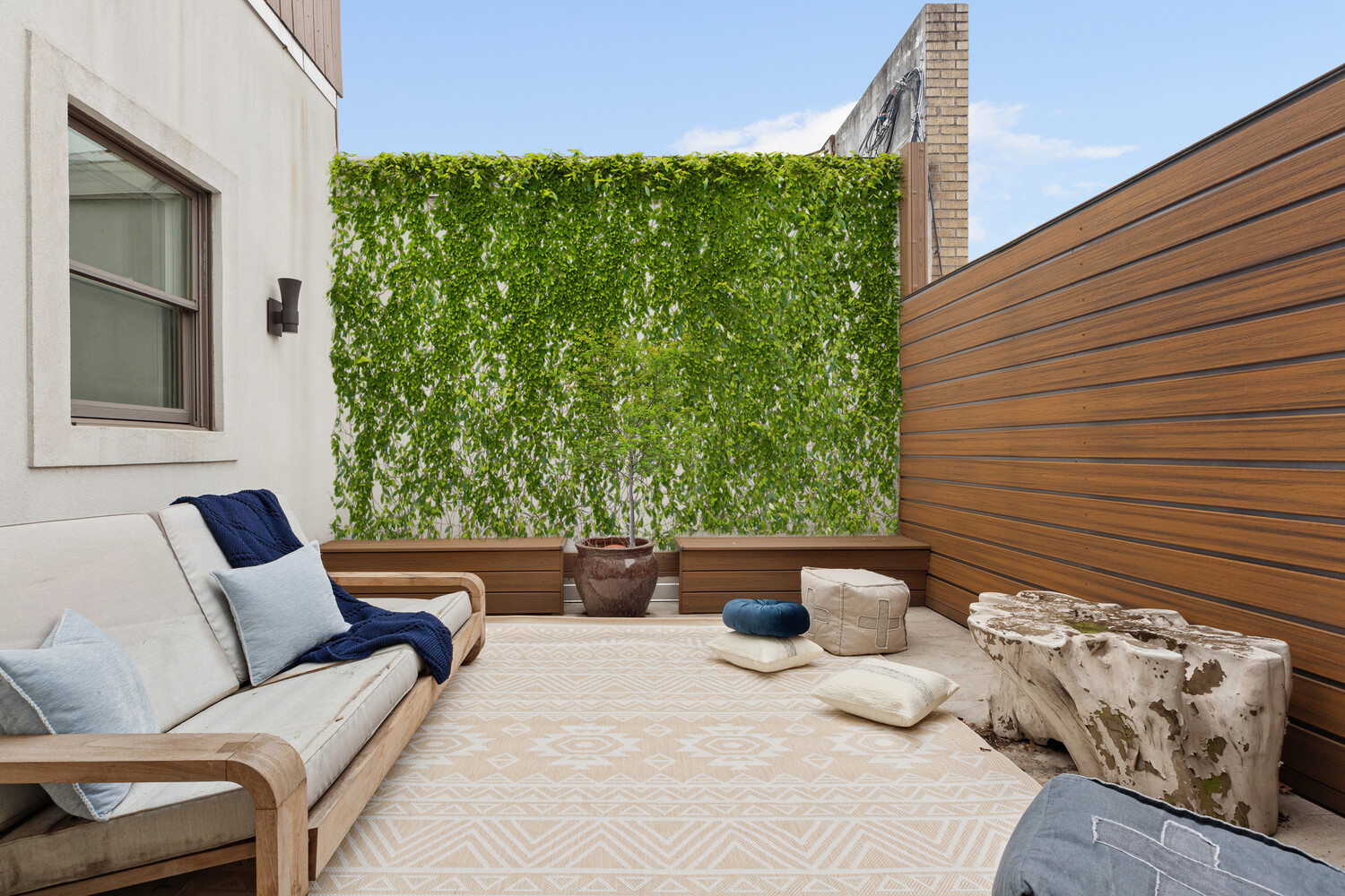 521 West 47th Street, Unit PHD Manhattan, NY 10036 - Photo 13 of 14 a building outdoor space with furniture