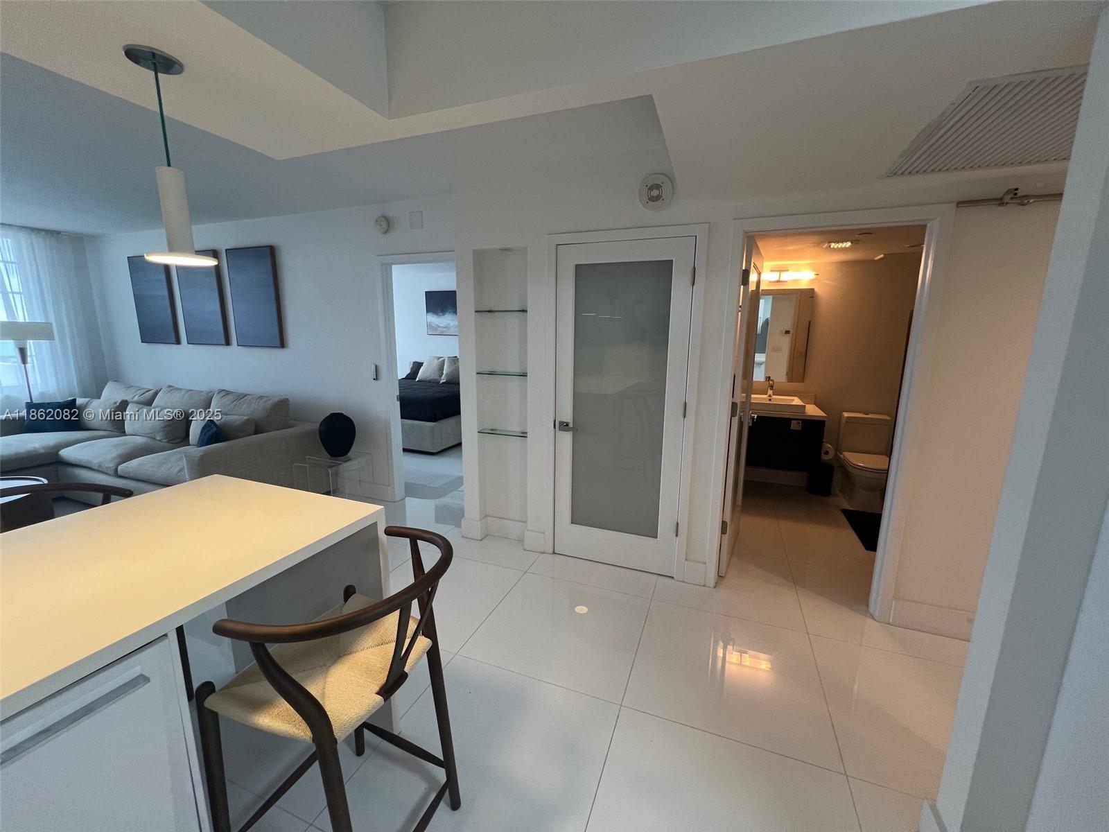 100 Lincoln Road, Unit 1022 Miami Beach, FL 33139 - Photo 21 of 63 a view of a livingroom with furniture and front door