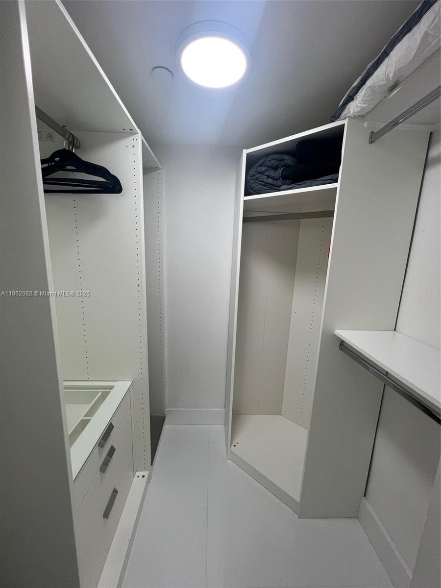 100 Lincoln Road, Unit 1022 Miami Beach, FL 33139 - Photo 32 of 63 a bathroom with a shower and a tub